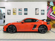 Conversion Body Kit for Porsche 718 981 Cayman & Boxster to GT4   Set includes:  Front bumper Front lip Front fenders Front vent covers Hood Rear bumper Rear fenders Rear diffuser  Spoiler  Exhaust system