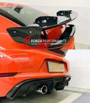 Conversion Body Kit for Porsche 718 981 Cayman & Boxster to GT4   Set includes:  Front bumper Front lip Front fenders Front vent covers Hood Rear bumper Rear fenders Rear diffuser  Spoiler  Exhaust system