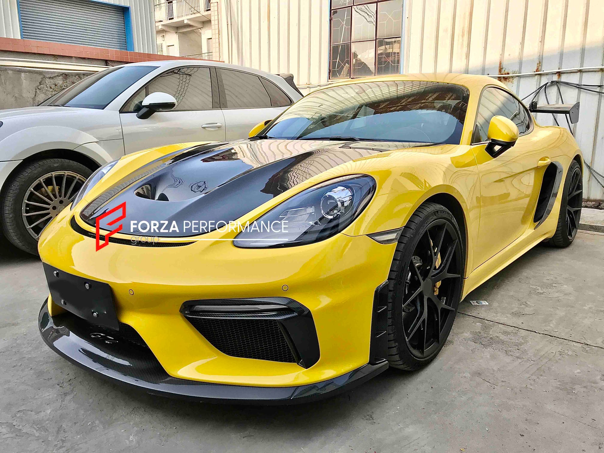 Conversion Body Kit for Porsche 718 981 Cayman & Boxster to GT4   Set includes:  Front bumper Front lip Front fenders Front vent covers Hood Rear bumper Rear fenders Rear diffuser  Spoiler  Exhaust system