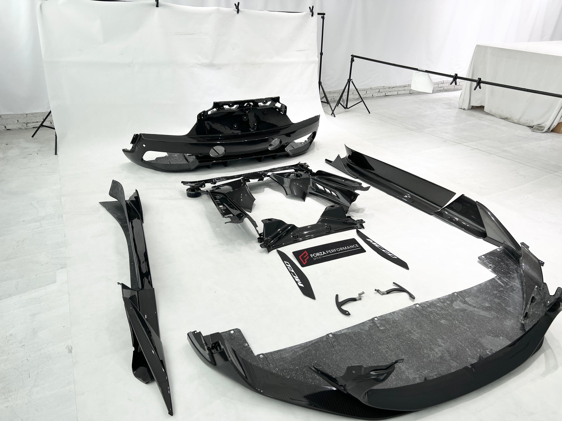OEM STYLE DRY CARBON BODY KIT for MASERATI MC20 2020+  Set includes: Front Lip Side Skirts Rear Diffuser Rear Vent Trims Side Mirror Covers Shift Paddles Center Dashboard Cover Door Sills Engine Cover