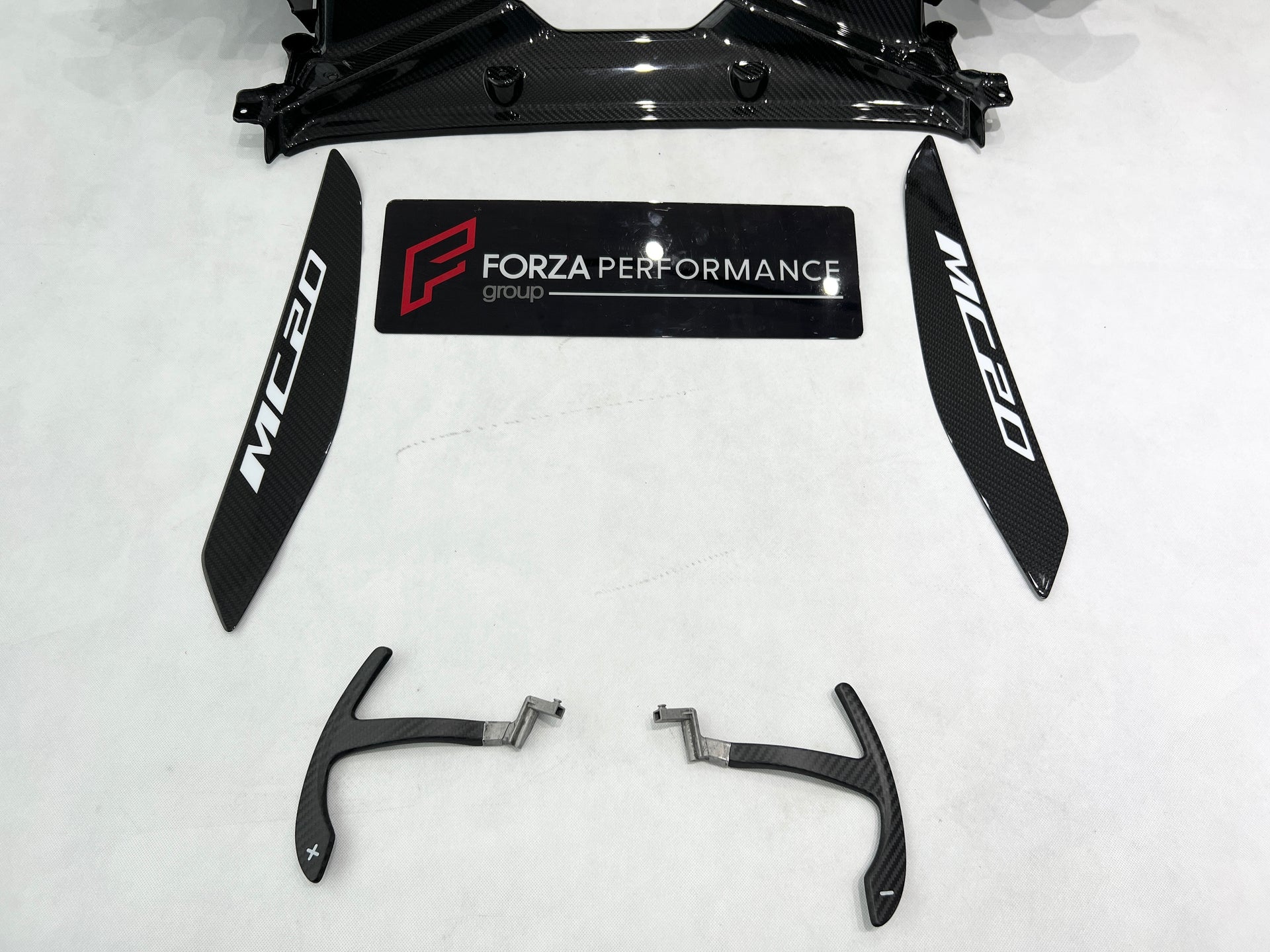 OEM STYLE DRY CARBON BODY KIT for MASERATI MC20 2020+  Set includes: Front Lip Side Skirts Rear Diffuser Rear Vent Trims Side Mirror Covers Shift Paddles Center Dashboard Cover Door Sills Engine Cover