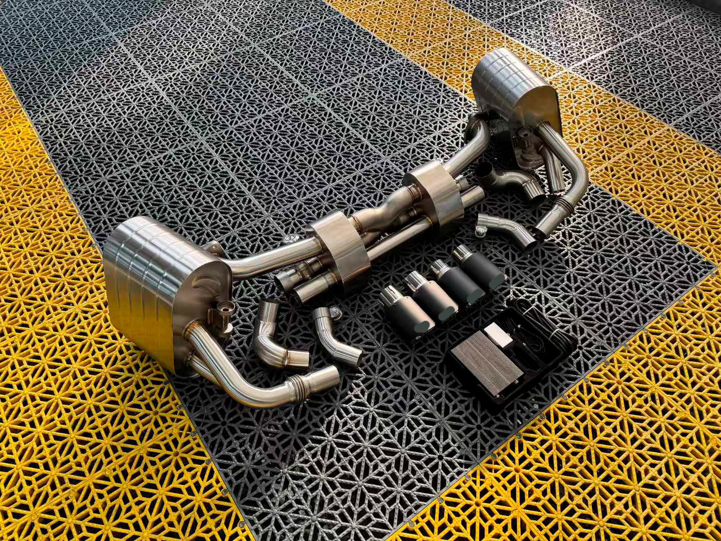 VALVED EXHAUST CATBACK MUFFLER for PORSCHE 911 991.1 CARRERA S 3.4T 3.8T 2011 - 2015
Set includes:
Pair of mufflers with valves
Exhaust tips
Valve control box with remote control (you may also reuse your factory exhaust valve motors)
Factory exhaust tips must be reused
Material: Stainless steel (for an extra cost we can make titanium)
Optional: We can offer downpipe and catless downpipe
Production time: 10 days
FEATURES:
Engineered Digital prototyping using 3D CAD design software, each car model ch