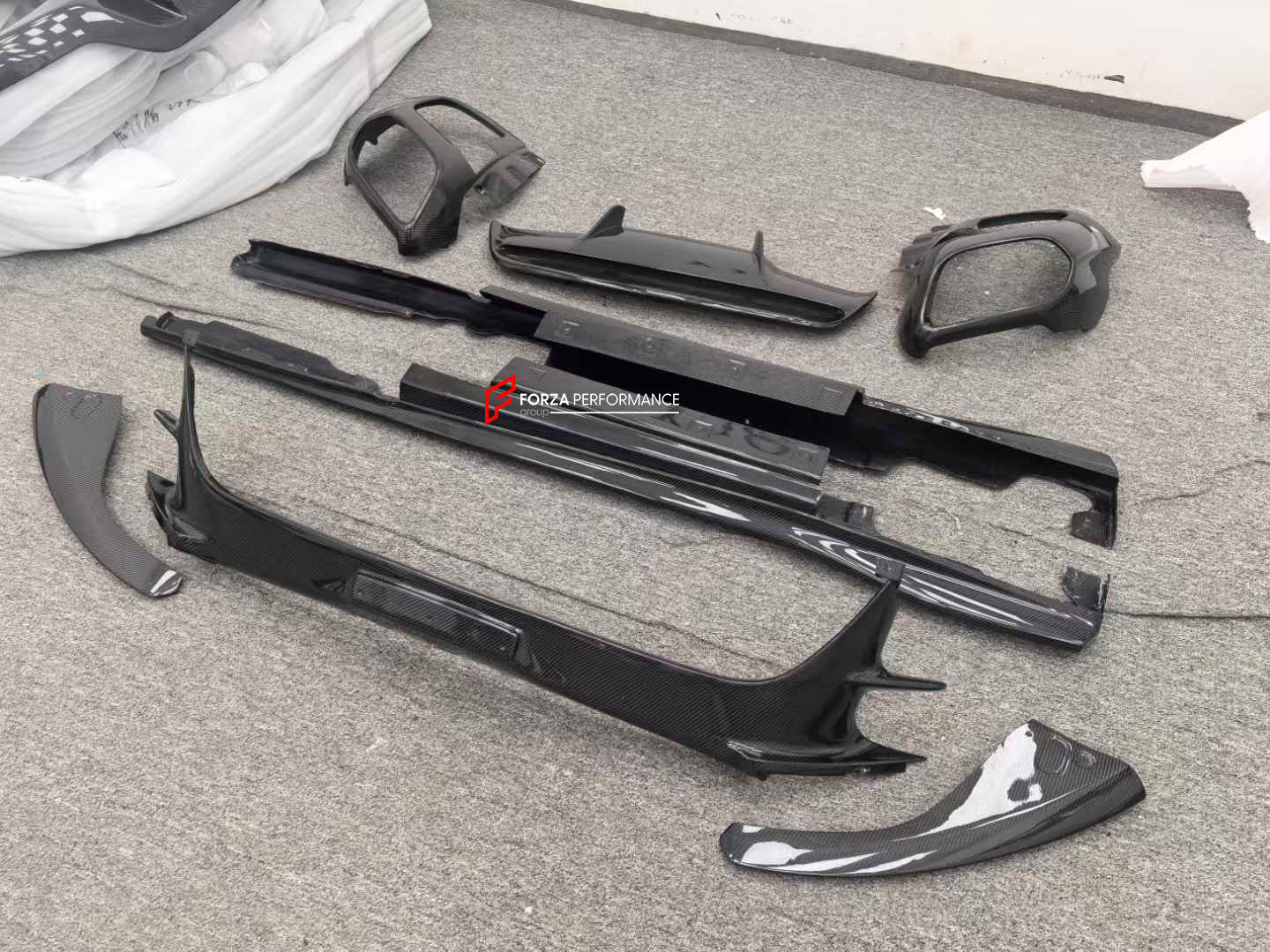 REPLACEMENT CARBON BODY KIT for FERRARI 812 SUPERFAST GTS 2017+
Set includes:
Front Splitter
Engine Bay Panels
Door Seals
Side Skirts
Rear Hood / Bonnet Lower Insert
Rear Lip
Rear Diffuser
Material: Dry Carbon
Note: Professional installation is required