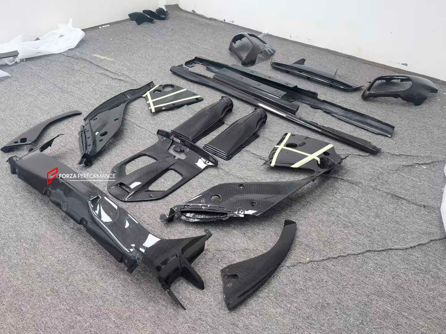 REPLACEMENT CARBON BODY KIT for FERRARI 812 SUPERFAST GTS 2017+
Set includes:
Front Splitter
Engine Bay Panels
Door Seals
Side Skirts
Rear Hood / Bonnet Lower Insert
Rear Lip
Rear Diffuser
Material: Dry Carbon
Note: Professional installation is required