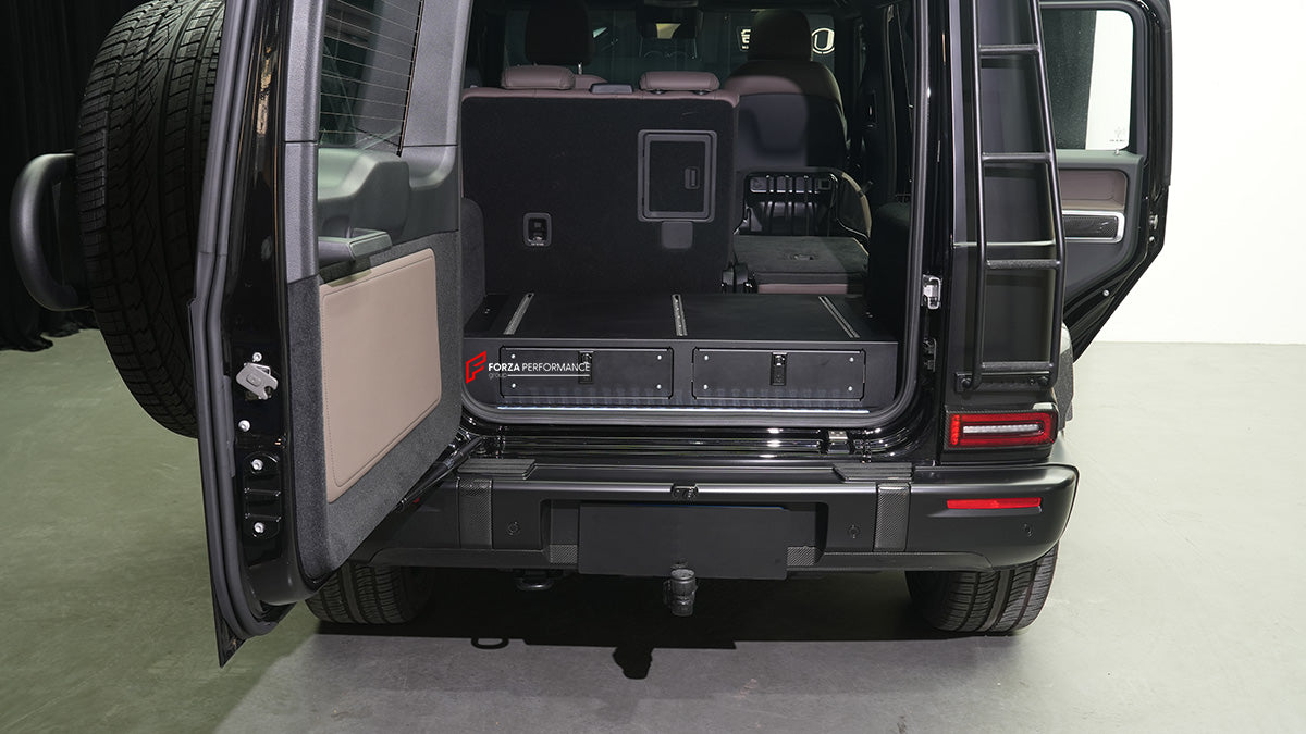 TRUNK STORAGE for MERCEDES-BENZ G-CLASS G63 W465 2024+
Set includes:
Trunk Storage
NOTE: Professional installation is required.