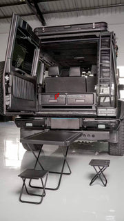 TRUNK STORAGE with TABLE and FOLDING STOOLS for MERCEDES-BENZ G-CLASS G63 G550 G500 W465 2024+
Set includes:
Trunk Storage
Table
Folding Stools
NOTE: Professional installation is required.