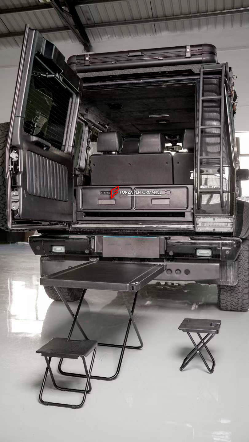 TRUNK STORAGE with TABLE and FOLDING STOOLS for MERCEDES-BENZ G-CLASS G63 G550 G500 W465 2024+
Set includes:
Trunk Storage
Table
Folding Stools
NOTE: Professional installation is required.