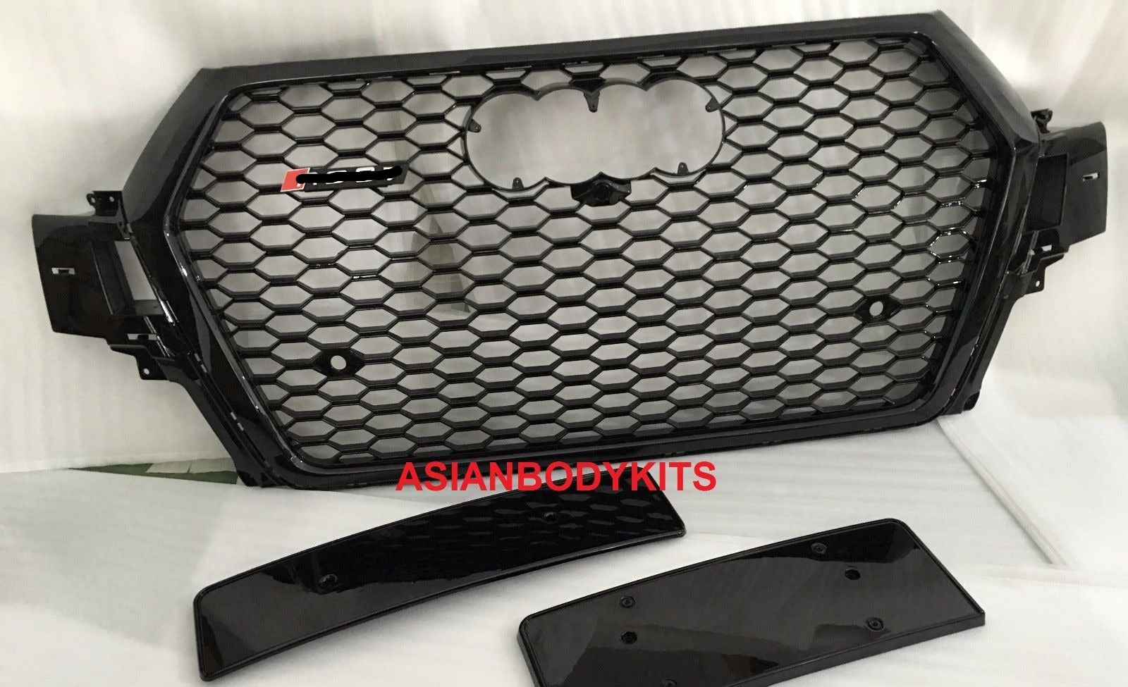 RSQ7 STYLE FRONT GRILLE HONEYCOMB MESH BLACK for AUDI Q7 4M 2015 - 2019 Has PDC holes with plugs Euro license plate holder (removable) Includes the badge (removable) The front camera body is optional. Please tell us if you have a front camera before buying. We are shipping with the camera body by default Night vision hole is optional. Please tell us if you have a night vision before buying. We are shipping with the hole for night vision camera by default