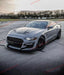 CONVERSION FORD MUSTANG GT500 BODY KIT for FORD MUSTANG S550 2018 - 2023 FORZA PERFORMANCE Custom Fit
Set includes:
Front Bumper Assembly
Side Skirts Add Ons
Rear Diffuser with Exhaust Tips
Material: ABS Plastic and PP
NOTE: Professional installation is required.