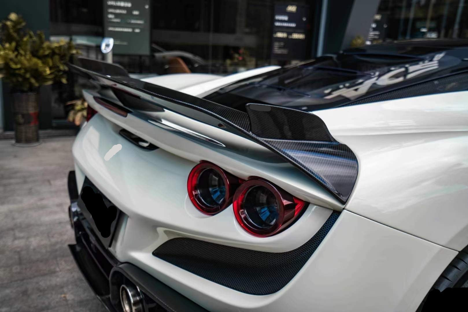 FPG Style Dry Carbon Fiver Body Kit For Ferrari F8  Set include:   Front lip Front trims Side skirts  Rear bumper Rear spoiler Material: Fiberglass with carbon fiber