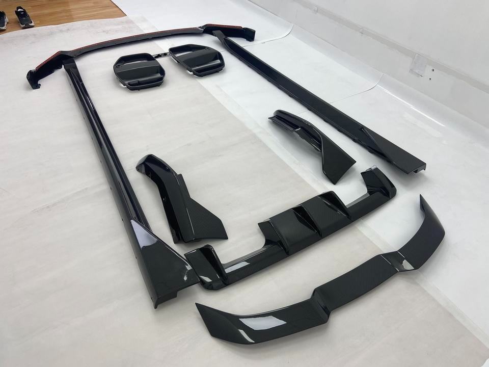 VORSTEINER CARBON BODY KIT FOR BMW M3 G80 M4 G82 2020+  Set include:   Front Lip Front Grille Side Skirts Rear Diffuser Spoiler Material: Real Carbon Fiber  NOTE: Professional installation is required