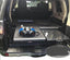 Slide Kitchen Drawer Systems For Mitsubishi Pajero by Forza Performance Simplify the storage and organization of equipment and valuables. These lockable drawers with integrated deck and faceplates were designed specifically for the Mitsubishi Pajero. Hide the contents from prying eyes, while creating a more convenient and easily accessible storage space in your car. Designed solidly for tough for both on and off-road travel.
