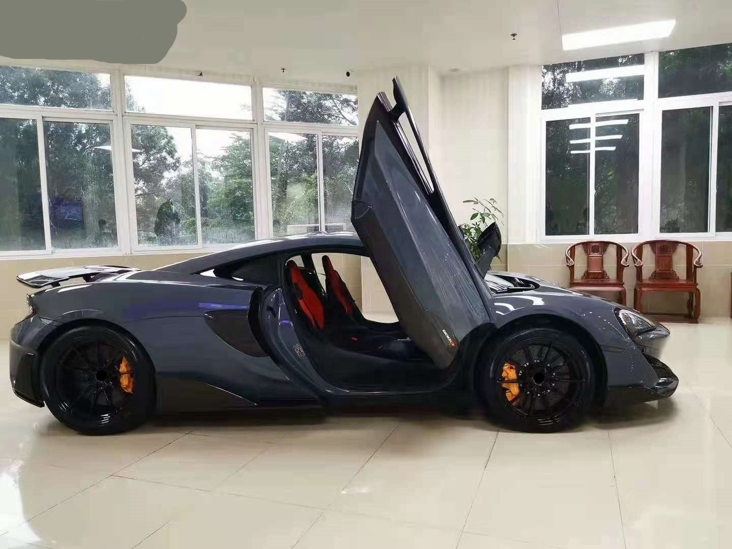 Auto Accessories Carbon Fiber Front Bumper Side Skirts Hood For McLaren 540C 570S Modify 600LT Style Body KitCarbon Fiber Conversion Body Kit For MCLAREN 570S 540C TO 600LT  Set Include:  Front Bumper Front Hood Rear Hood Rear Bumper Rear Spoiler Material: Carbon Fiber