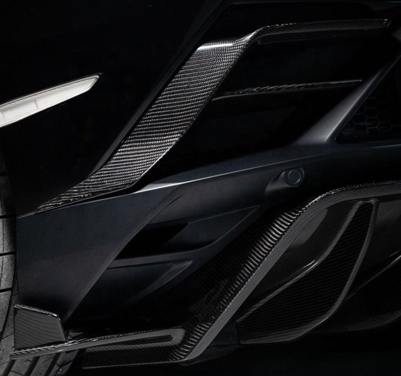 Forza Dry Carbon Rear Bumper Trims For Lamborghini Huracan 2014+  Set include: Trims Material: Dry Carbon  NOTE: Professional installation is required during installation