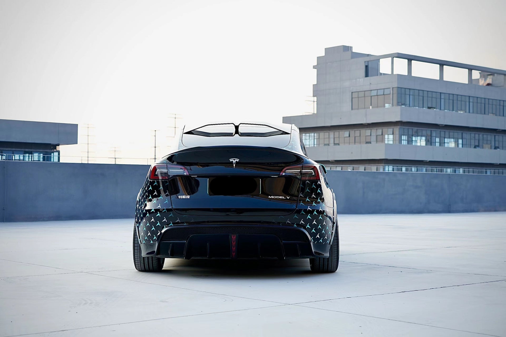 FORZA PERFORMANCE BODY KIT for TESLA Model Y Body Kit for Tesla Model Y  Set include:   Front bumper assembly with front lip Front hood Side skirts Wide fenders (can use without) Rear diffuser Trunk spoiler  Roof Spoiler Material: Carbon or PP