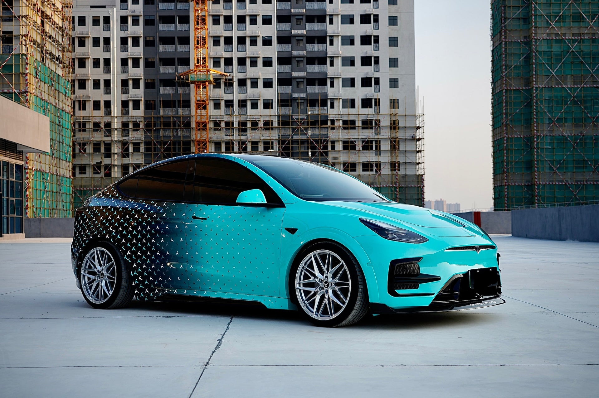 FORZA PERFORMANCE BODY KIT for TESLA Model Y Body Kit for Tesla Model Y  Set include:   Front bumper assembly with front lip Front hood Side skirts Wide fenders (can use without) Rear diffuser Trunk spoiler  Roof Spoiler Material: Carbon or PP