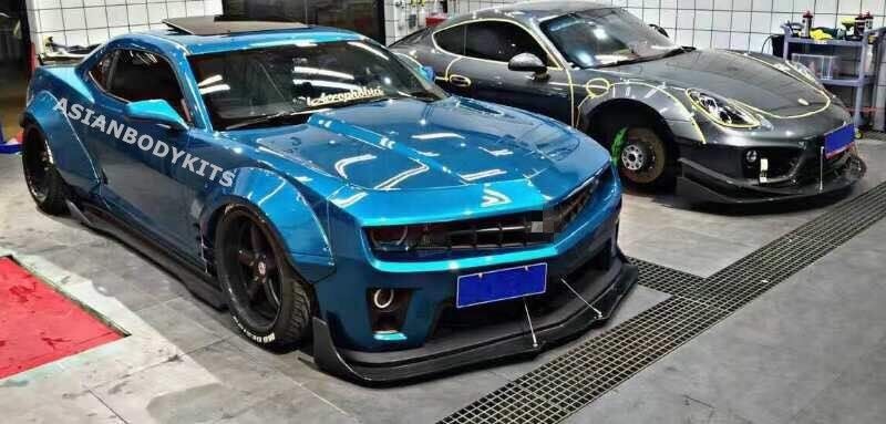 BODY KIT for CHEVROLET CAMARO 2010 - 2013  Set includes:  Front Lip (designed to fit an aftermarket ZL1 front bumper. if you are installing this kit on 3.6 or SS bumpers, it requires modifications) Fender Flares Side Skirts Rear Spoiler Rear Diffuser