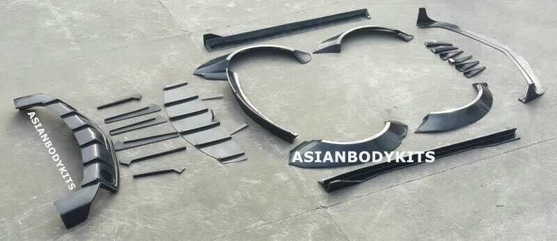 BODY KIT for CHEVROLET CAMARO 2010 - 2013  Set includes:  Front Lip (designed to fit an aftermarket ZL1 front bumper. if you are installing this kit on 3.6 or SS bumpers, it requires modifications) Fender Flares Side Skirts Rear Spoiler Rear Diffuser