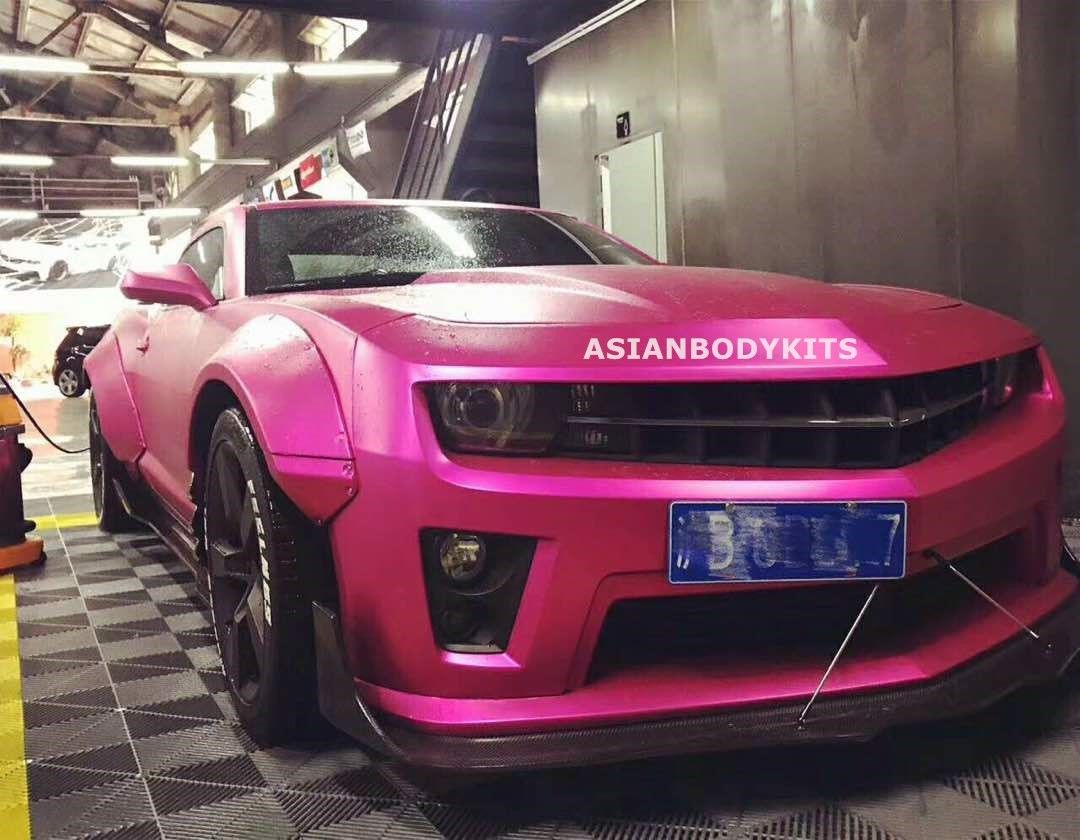 BODY KIT for CHEVROLET CAMARO 2010 - 2013  Set includes:  Front Lip (designed to fit an aftermarket ZL1 front bumper. if you are installing this kit on 3.6 or SS bumpers, it requires modifications) Fender Flares Side Skirts Rear Spoiler Rear Diffuser