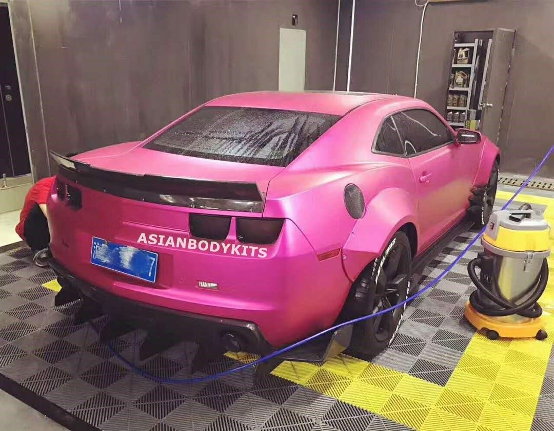BODY KIT for CHEVROLET CAMARO 2010 - 2013  Set includes:  Front Lip (designed to fit an aftermarket ZL1 front bumper. if you are installing this kit on 3.6 or SS bumpers, it requires modifications) Fender Flares Side Skirts Rear Spoiler Rear Diffuser