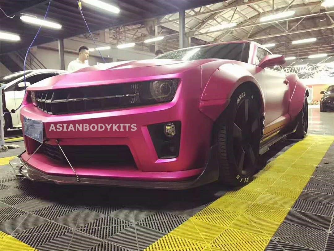 BODY KIT for CHEVROLET CAMARO 2010 - 2013  Set includes:  Front Lip (designed to fit an aftermarket ZL1 front bumper. if you are installing this kit on 3.6 or SS bumpers, it requires modifications) Fender Flares Side Skirts Rear Spoiler Rear Diffuser