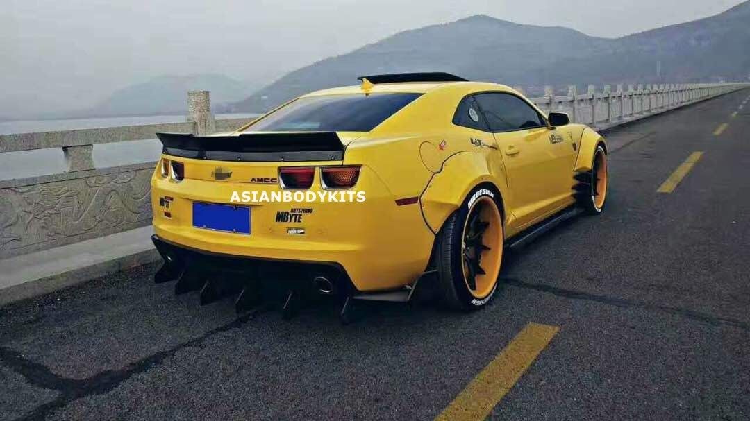 BODY KIT for CHEVROLET CAMARO 2010 - 2013  Set includes:  Front Lip (designed to fit an aftermarket ZL1 front bumper. if you are installing this kit on 3.6 or SS bumpers, it requires modifications) Fender Flares Side Skirts Rear Spoiler Rear Diffuser