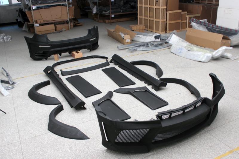 BODY KIT for BMW X6 E71  Set includes:  Front Bumper Fender Flares Side Skirts Door Panels Trunk Spoiler Roof Spoiler
