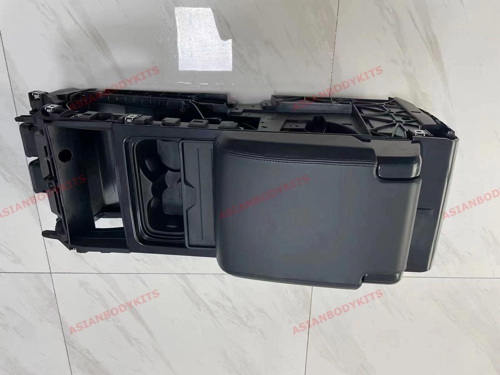 Middle Armrest Console Box For Land Rover Defender L663 2019+ Set include: Armrest Console Box Material: ABS plastics Note: Professional installation is required