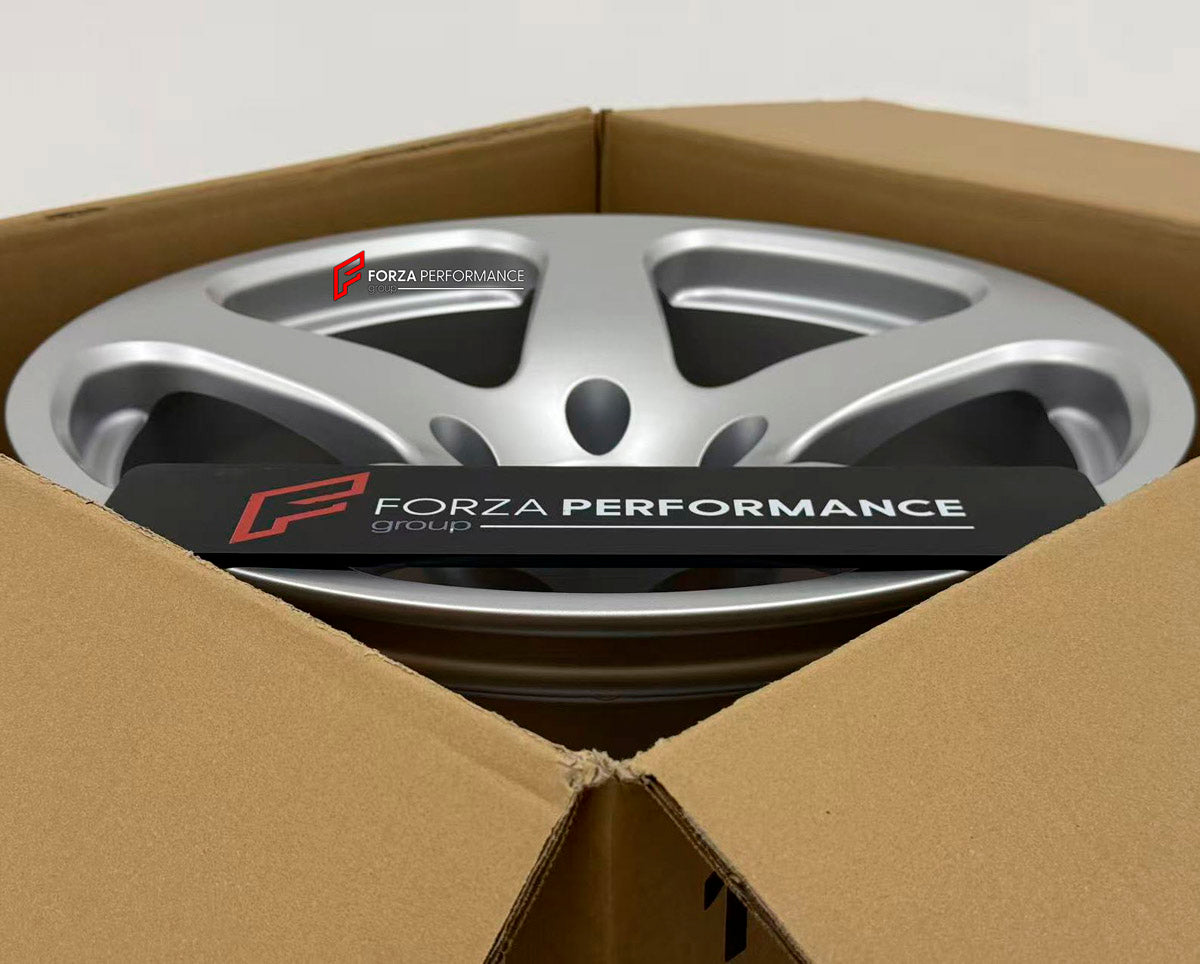 We manufacture premium quality forged wheels rims for Porsche 911 996 TURBO 1997 - 2006 in any design, size, color.

WHEEL SIZE:

Front: 18 x 8.0 ET 50
Rear: 18 x 11 ET 45
PCD: 5 x 130
CB: 71.6
Finish: Full Matte Silver
Material: 6061-T6 Forged Aluminum

THIS WHEEL DESIGN CAN BE CUSTOM-MADE FOR YOUR CAR IN ANY SIZE AND COLOR OPTIONS
Available in monoblock, 2-piece, 3-piece, duoblock, beadlock
3D wheel renderings are provided according to the exact dimensions and specifications requested by the client, ensur