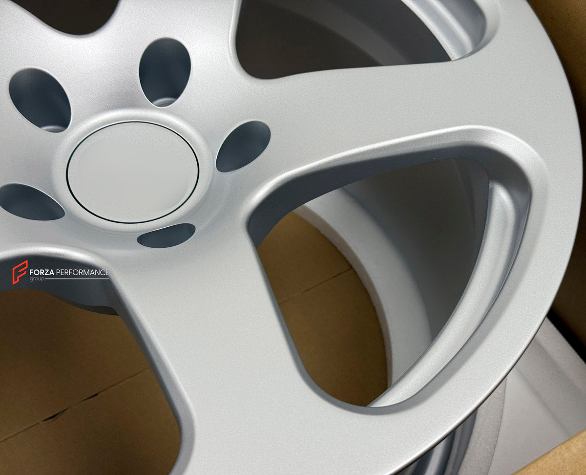 We manufacture premium quality forged wheels rims for Porsche 911 996 TURBO 1997 - 2006 in any design, size, color.

WHEEL SIZE:

Front: 18 x 8.0 ET 50
Rear: 18 x 11 ET 45
PCD: 5 x 130
CB: 71.6
Finish: Full Matte Silver
Material: 6061-T6 Forged Aluminum

THIS WHEEL DESIGN CAN BE CUSTOM-MADE FOR YOUR CAR IN ANY SIZE AND COLOR OPTIONS
Available in monoblock, 2-piece, 3-piece, duoblock, beadlock
3D wheel renderings are provided according to the exact dimensions and specifications requested by the client, ensur