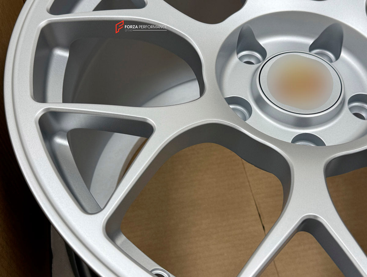 We manufactured premium quality forged wheels rims for our client's Porsche 911 997.2 S Cabriolet 2008 - 2013 with the following specifications:

WHEEL SIZE:

Front: 19 x 9 ET 50
Rear: 19 x 11.5 ET 65
PCD: 5 x 130
CB: 71.6
Finish: Satin Silver
Material: 6061-T6 Forged Aluminum
THIS WHEEL DESIGN CAN BE CUSTOM-MADE FOR YOUR CAR IN ANY SIZE AND COLOR OPTIONS
Available in monoblock, 2-piece, 3-piece, duoblock, beadlock
3D wheel renderings are provided according to the exact dimensions and specifications request