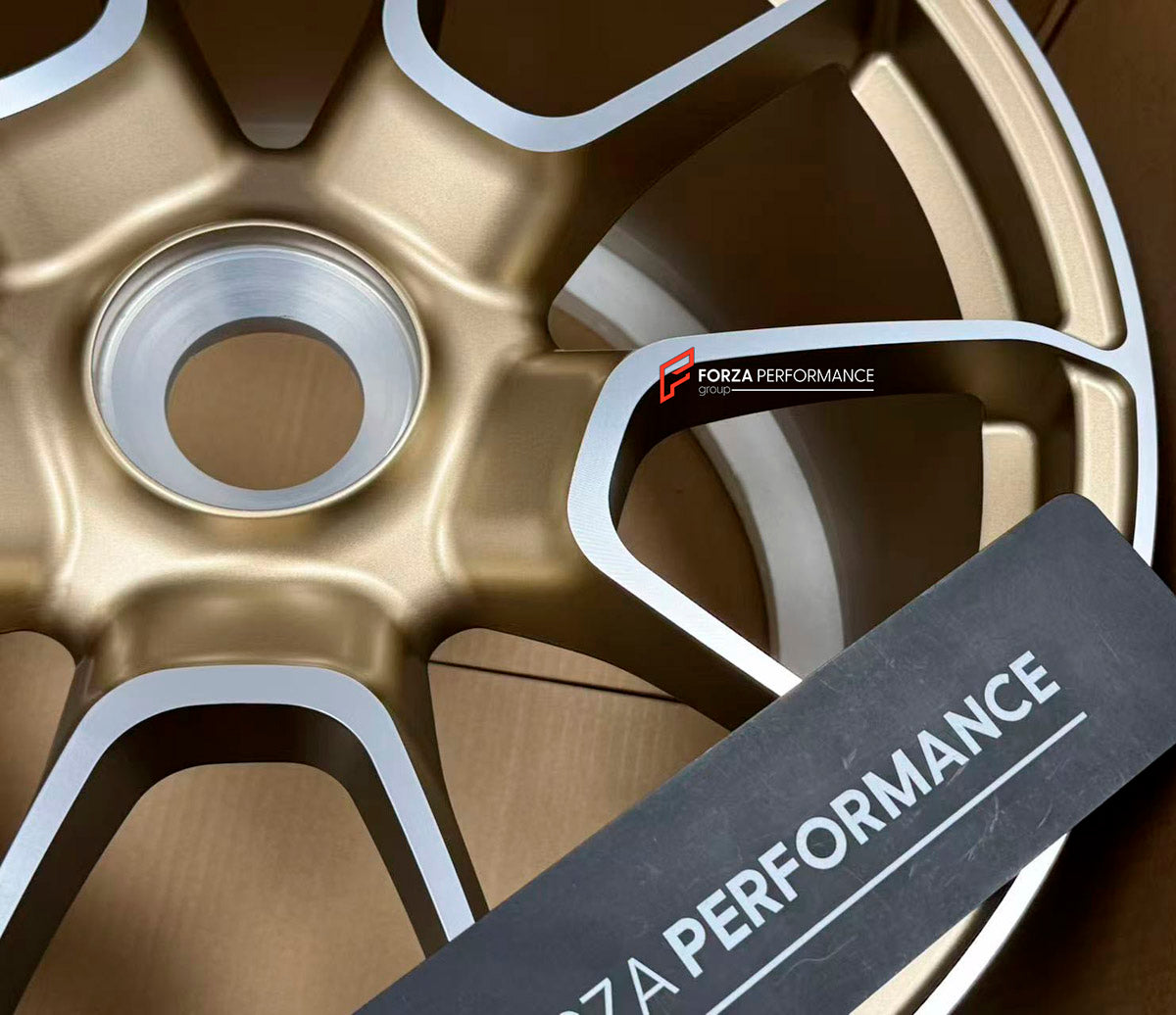 We manufacture premium quality forged wheels rims for Porsche 911 992.1 TURBO S 2019 - 2025 in any design, size, color.

WHEEL SIZE:

Front: 20 x 9.5 ET 44
Rear: 21 x 12 ET 70
PCD: 5 x 130
CB: 71.6
Finish: Satin Gold with Machinied Face
Material: 6061-T6 Forged Aluminum

THIS WHEEL DESIGN CAN BE CUSTOM-MADE FOR YOUR CAR IN ANY SIZE AND COLOR OPTIONS
Available in monoblock, 2-piece, 3-piece, duoblock, beadlock
3D wheel renderings are provided according to the exact dimensions and specifications requested by 