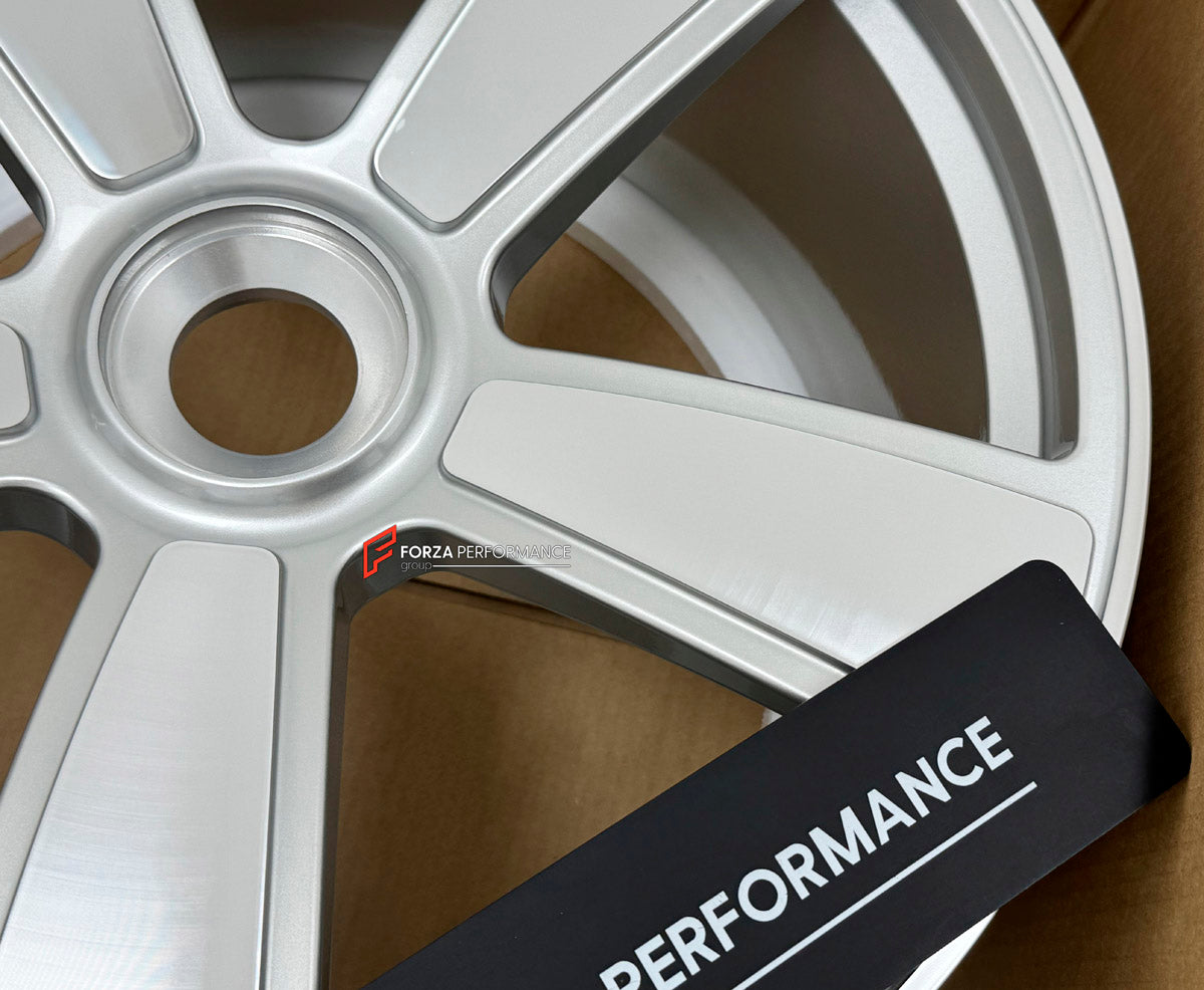 We manufacture premium quality forged wheels rims for Porsche 911 992.1 GTS 2019 - 2025 in any design, size, color.

WHEEL SIZE:

Front: 21 x 8.5 ET 40
Rear: 22 x 11.5 ET 57
PCD: 5 x 130
CB: 71.6
Finish: Gloss Silver with Machined Face
Material: 6061-T6 Forged Aluminum
THIS WHEEL DESIGN CAN BE CUSTOM-MADE FOR YOUR CAR IN ANY SIZE AND COLOR OPTIONS
Available in monoblock, 2-piece, 3-piece, duoblock, beadlock
3D wheel renderings are provided according to the exact dimensions and specifications requested by th