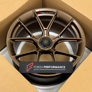 We manufacture premium quality forged wheels rims for Porsche 718 Cayman GT4 2024 in any design, size, color.

WHEEL SIZE:

Front: 21 x 11.5 ET 22
Rear: 21 x 11.5 ET 22
PCD: 5 x 112
CB: 66.5
Finish: Dark Satin Bronze
Material: 6061-T6 Forged Aluminum
THIS WHEEL DESIGN CAN BE CUSTOM-MADE FOR YOUR CAR IN ANY SIZE AND COLOR OPTIONS
Available in monoblock, 2-piece, 3-piece, duoblock, beadlock
3D wheel renderings are provided according to the exact dimensions and specifications requested by the client, ensuring 