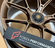 We manufacture premium quality forged wheels rims for Porsche 718 Cayman GT4 2024 in any design, size, color.

WHEEL SIZE:

Front: 21 x 11.5 ET 22
Rear: 21 x 11.5 ET 22
PCD: 5 x 112
CB: 66.5
Finish: Dark Satin Bronze
Material: 6061-T6 Forged Aluminum
THIS WHEEL DESIGN CAN BE CUSTOM-MADE FOR YOUR CAR IN ANY SIZE AND COLOR OPTIONS
Available in monoblock, 2-piece, 3-piece, duoblock, beadlock
3D wheel renderings are provided according to the exact dimensions and specifications requested by the client, ensuring 