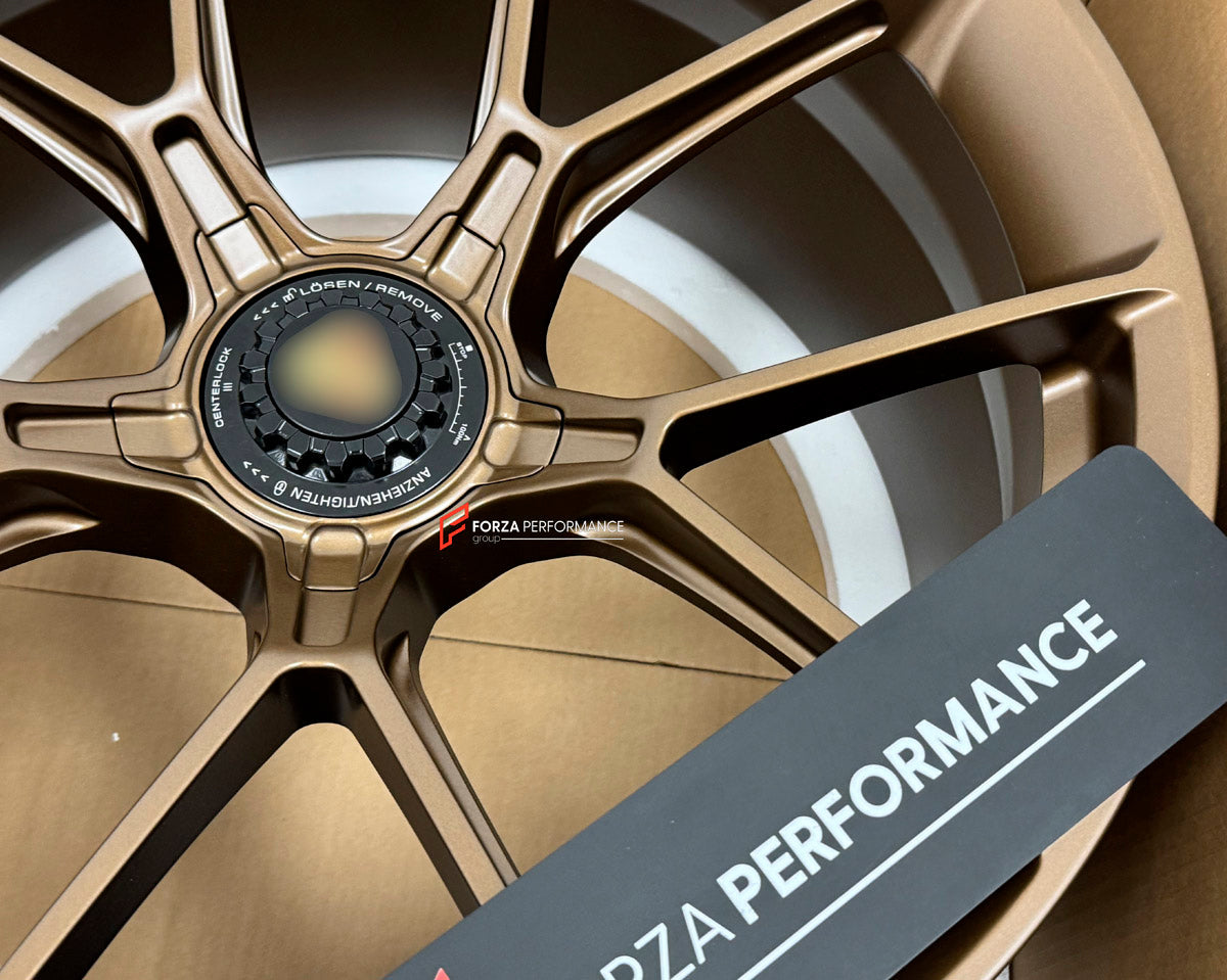 We manufacture premium quality forged wheels rims for Porsche 718 Cayman GT4 2024 in any design, size, color.

WHEEL SIZE:

Front: 21 x 11.5 ET 22
Rear: 21 x 11.5 ET 22
PCD: 5 x 112
CB: 66.5
Finish: Dark Satin Bronze
Material: 6061-T6 Forged Aluminum
THIS WHEEL DESIGN CAN BE CUSTOM-MADE FOR YOUR CAR IN ANY SIZE AND COLOR OPTIONS
Available in monoblock, 2-piece, 3-piece, duoblock, beadlock
3D wheel renderings are provided according to the exact dimensions and specifications requested by the client, ensuring 