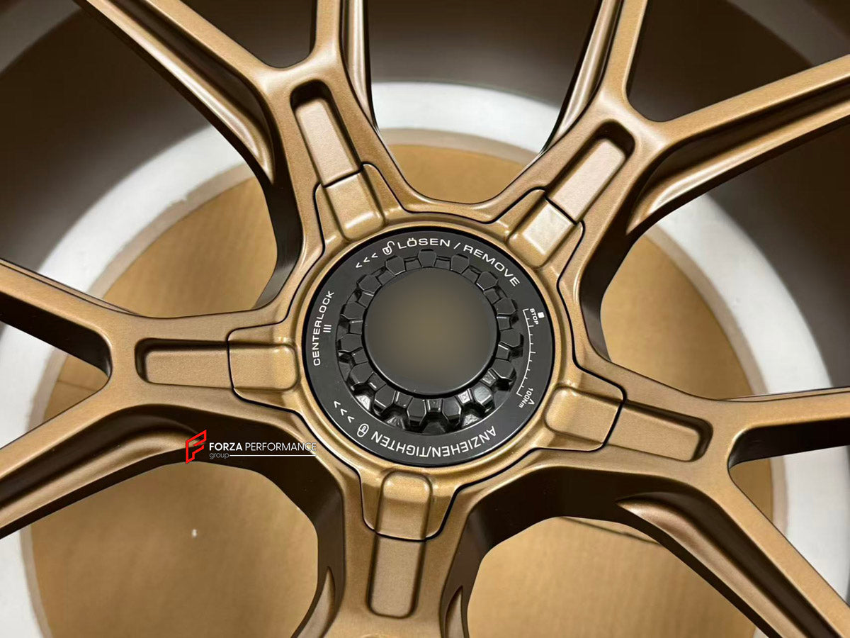 We manufacture premium quality forged wheels rims for Porsche 718 Cayman GT4 2024 in any design, size, color.

WHEEL SIZE:

Front: 21 x 11.5 ET 22
Rear: 21 x 11.5 ET 22
PCD: 5 x 112
CB: 66.5
Finish: Dark Satin Bronze
Material: 6061-T6 Forged Aluminum
THIS WHEEL DESIGN CAN BE CUSTOM-MADE FOR YOUR CAR IN ANY SIZE AND COLOR OPTIONS
Available in monoblock, 2-piece, 3-piece, duoblock, beadlock
3D wheel renderings are provided according to the exact dimensions and specifications requested by the client, ensuring 
