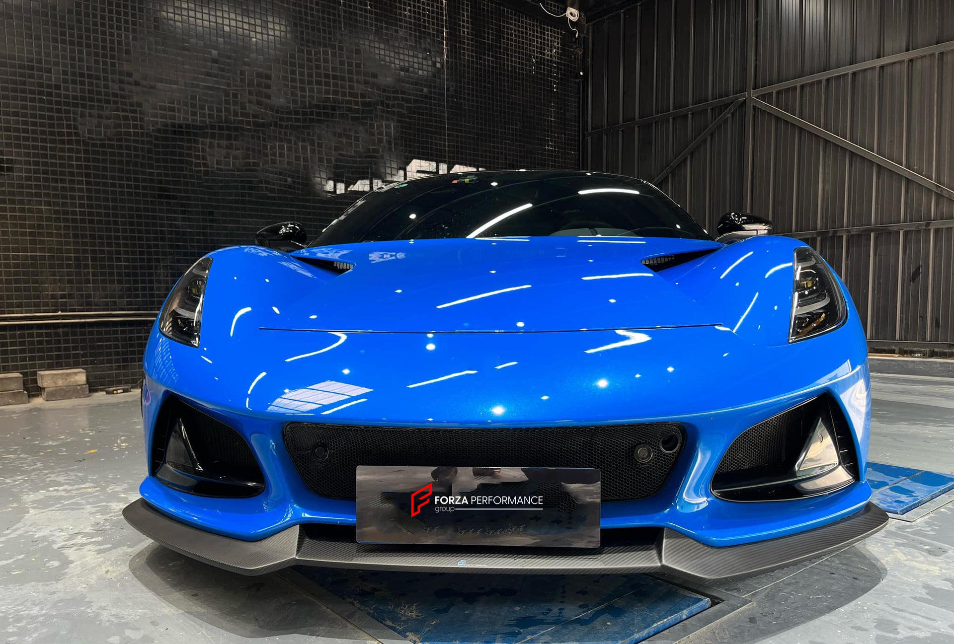 DRY CARBON BODY KIT for LOTUS EMIRA  Set includes:  Front Lip Side Skirts Rear Diffuser Rear Spoiler Front Air Vents Side Air Vents Rear Air Duct Side Mirrors