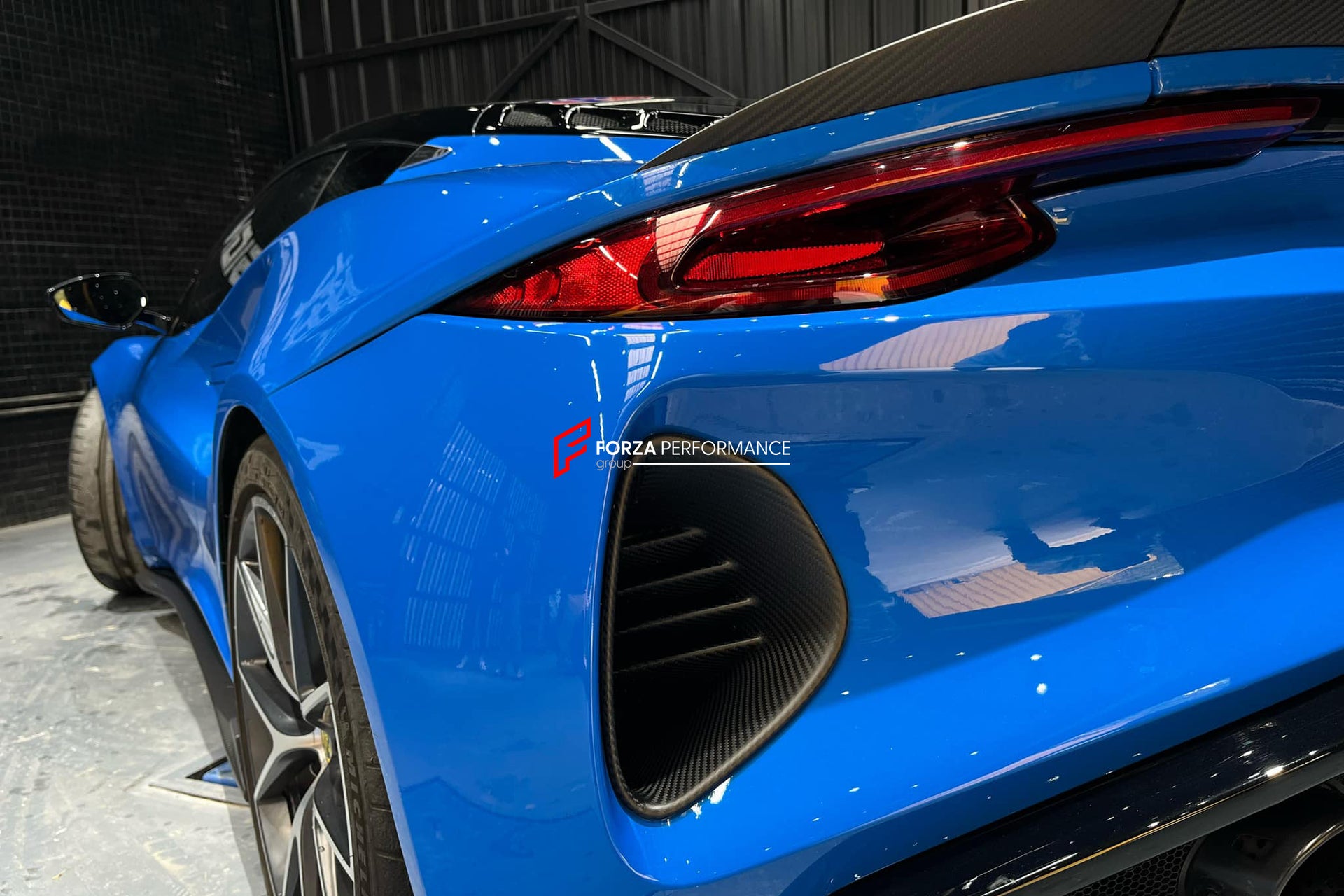 DRY CARBON BODY KIT for LOTUS EMIRA  Set includes:  Front Lip Side Skirts Rear Diffuser Rear Spoiler Front Air Vents Side Air Vents Rear Air Duct Side Mirrors