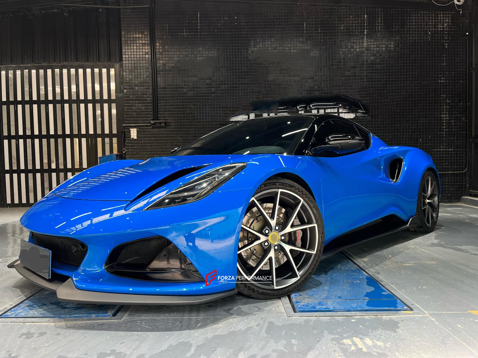 DRY CARBON BODY KIT for LOTUS EMIRA  Set includes:  Front Lip Side Skirts Rear Diffuser Rear Spoiler Front Air Vents Side Air Vents Rear Air Duct Side Mirrors