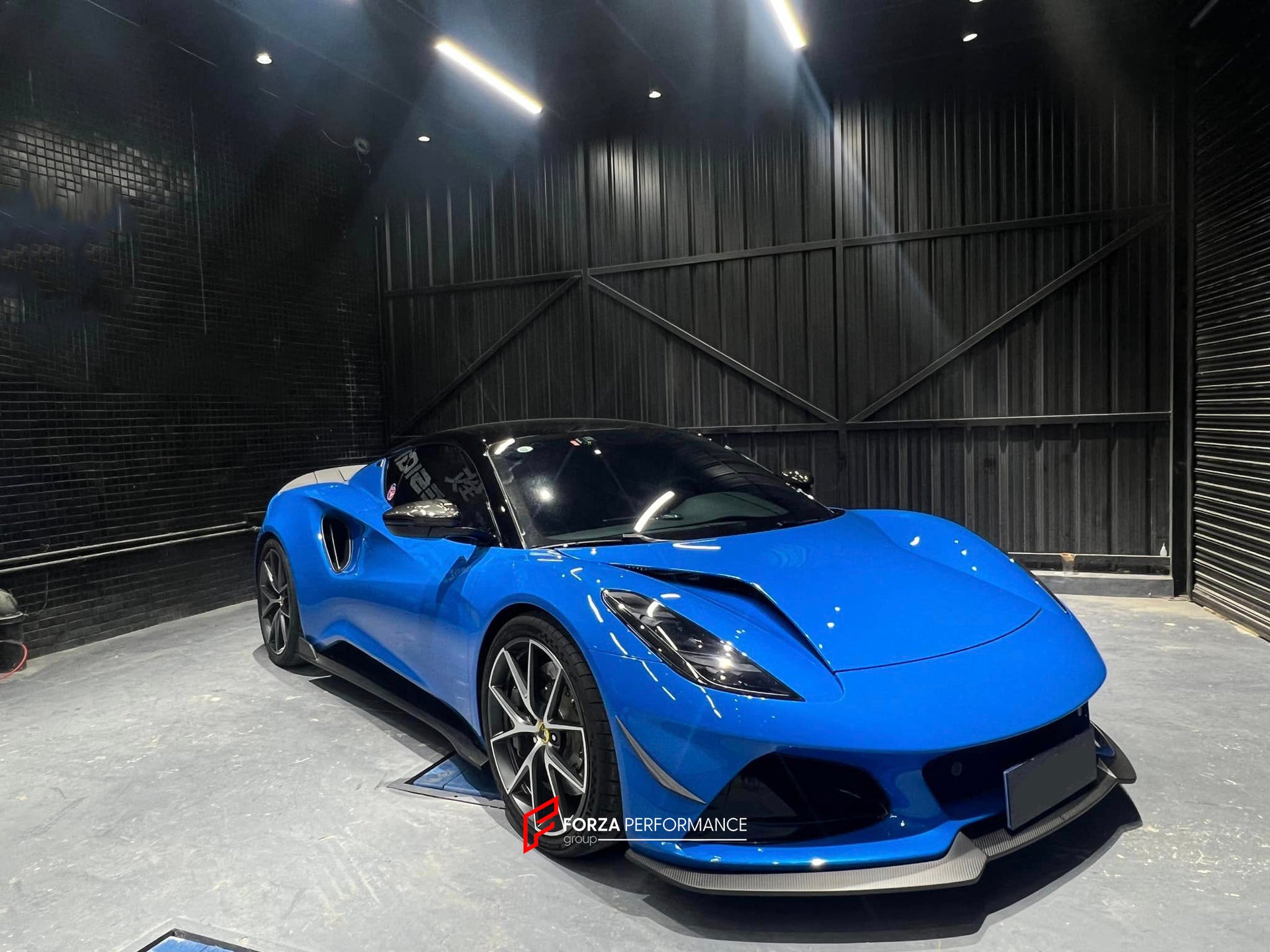DRY CARBON BODY KIT for LOTUS EMIRA  Set includes:  Front Lip Side Skirts Rear Diffuser Rear Spoiler Front Air Vents Side Air Vents Rear Air Duct Side Mirrors