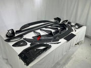 DRY CARBON BODY KIT for LOTUS EMIRA  Set includes:  Front Lip Side Skirts Rear Diffuser Rear Spoiler Front Air Vents Side Air Vents Rear Air Duct Side Mirrors