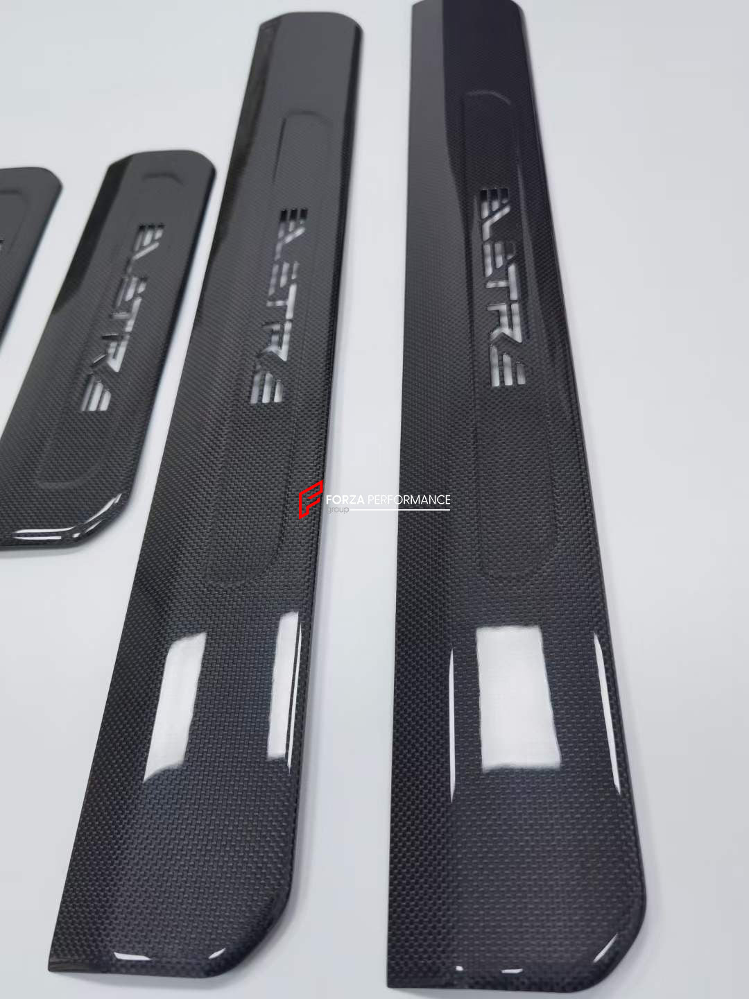 DRY CARBON INTERIOR KIT for LOTUS ELETRE  Set includes:  Front Doors Panel Covers Rear Doors Panel Covers Window Switch Covers Center Console Box Cover Light Frame Control Panel Cover Door Seals