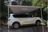 AWNING ON THE ROOF OF A CAR FOR OUTDOOR RECREATION