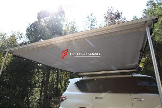 AWNING ON THE ROOF OF A CAR FOR OUTDOOR RECREATION