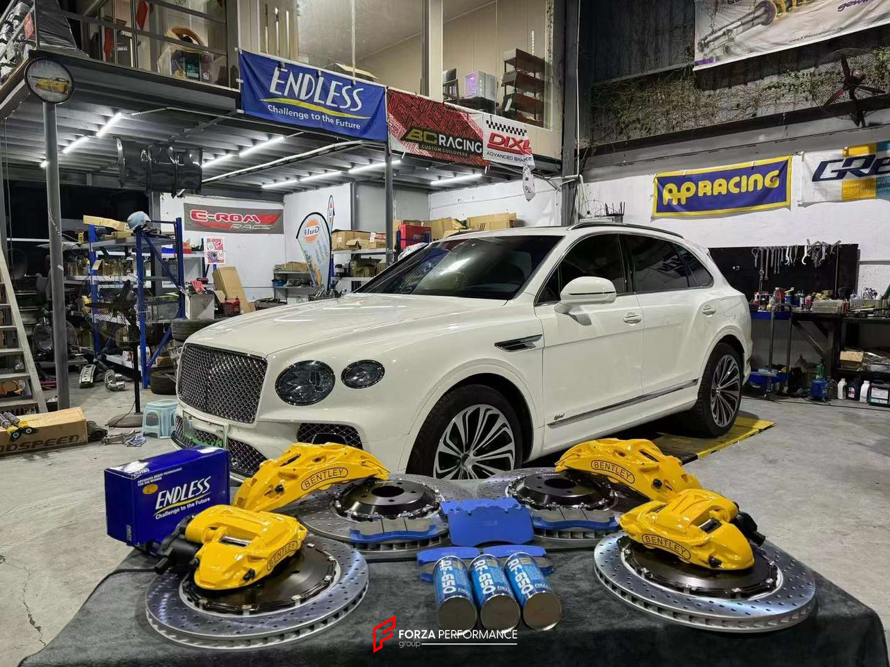 In the photos above you can see an installed Forza Performance Group set of large front brakes for the BENTLEY BENTAYGA PL71 FACELIFT 2020&nbsp;with 440x40mm / 400x38mm brake discs by 22-inch brake calipers.  Current set includes:  4x Brake calipers (10-piston front, 4-piston rear) 2x Front Brake discs 440x40mm  2x Rear Brake discs 400x38mm 4x Brake caliper adapters 4x Brake Pads  4x Brake hoses and installation kits with nipples