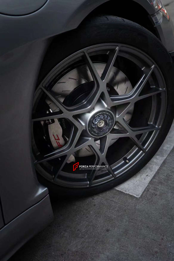 In the photos above you can see an installed Forza Performance Group set of large front brakes for the PORSCHE 911 992 GT3 with 380x34mm / 380x30mm brake discs by 20-inch brake rotors.  Current set includes:  4x Brake calipers 2x Front Brake discs&nbsp;380x34mm  2x Rear Brake discs 380x30mm 4x Brake caliper adapters 4x Brake Pads  4x Brake hoses and installation kits with nipples