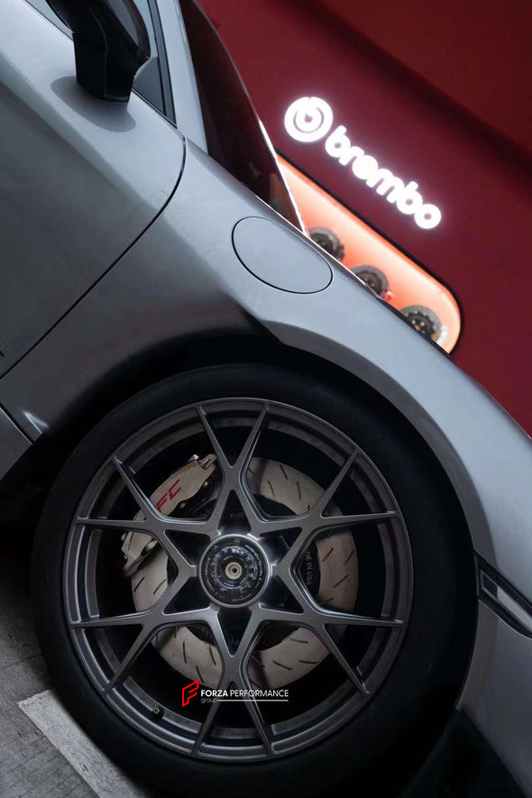 In the photos above you can see an installed Forza Performance Group set of large front brakes for the PORSCHE 911 992 GT3 with 380x34mm / 380x30mm brake discs by 20-inch brake rotors.  Current set includes:  4x Brake calipers 2x Front Brake discs&nbsp;380x34mm  2x Rear Brake discs 380x30mm 4x Brake caliper adapters 4x Brake Pads  4x Brake hoses and installation kits with nipples