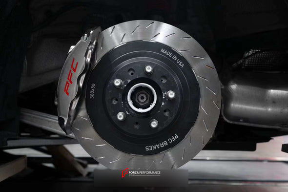 In the photos above you can see an installed Forza Performance Group set of large front brakes for the PORSCHE 911 992 GT3 with 380x34mm / 380x30mm brake discs by 20-inch brake rotors.  Current set includes:  4x Brake calipers 2x Front Brake discs&nbsp;380x34mm  2x Rear Brake discs 380x30mm 4x Brake caliper adapters 4x Brake Pads  4x Brake hoses and installation kits with nipples