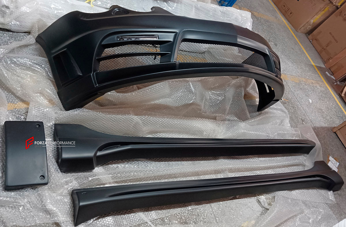 BODY KIT for BENTLEY FLYING SPUR 2005-2012

Set includes:
Front Bumper
Led DRL
Side Skirts
Rear Bumper
Trunk Spoiler
Exhaust Tips
Material: FRP Fiberglass

Note: Professional installation is required

Exhaust Tip Fitment Note: The included exhaust tip comes with a single-inlet (Y-joint) adapter. On vehicles with dual factory exhaust pipes, this adapter needs to be trimmed to size and welded onto both pipes to merge them into one outlet. Depending on your vehicle's exhaust configuration, additional welding m